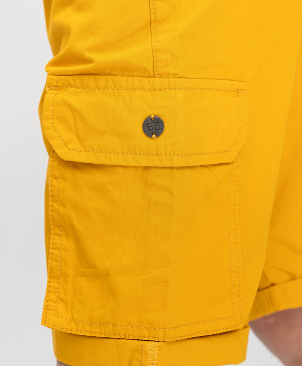 Желтые шорты Button Blue