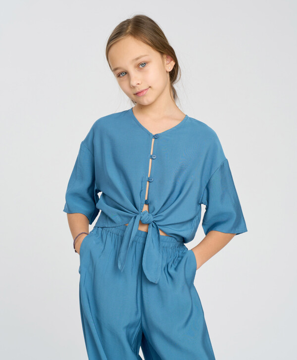 Блузка с коротким рукавом синяя укороченная с узлом для девочки Button Blue