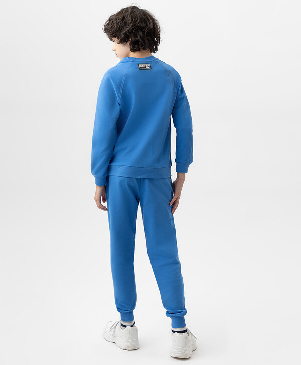 Брюки-джоггеры трикотажные синие Button Blue